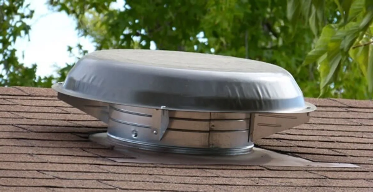 attic fan installation services with low-profile roof ventilation unit in Mesa, AZ