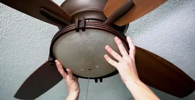 Ceiling fan repair and reinstallation on ceiling mount in Mesa, AZ