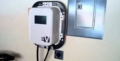 Electric car charger installation with wall-mounted EV charging station in Mesa, AZ