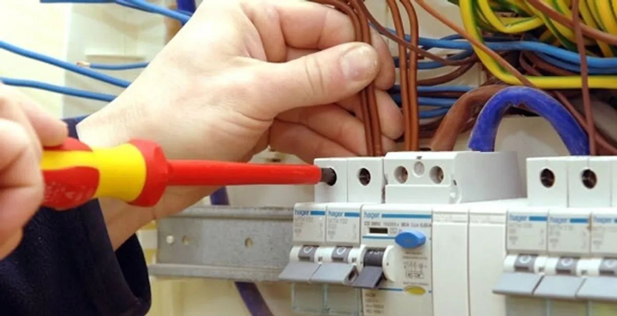 electrician services performing professional electrical panel wiring and connections in Mesa, AZ