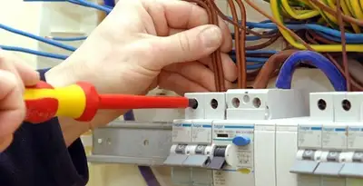 electrician services performing professional electrical panel wiring and connections in Mesa, AZ