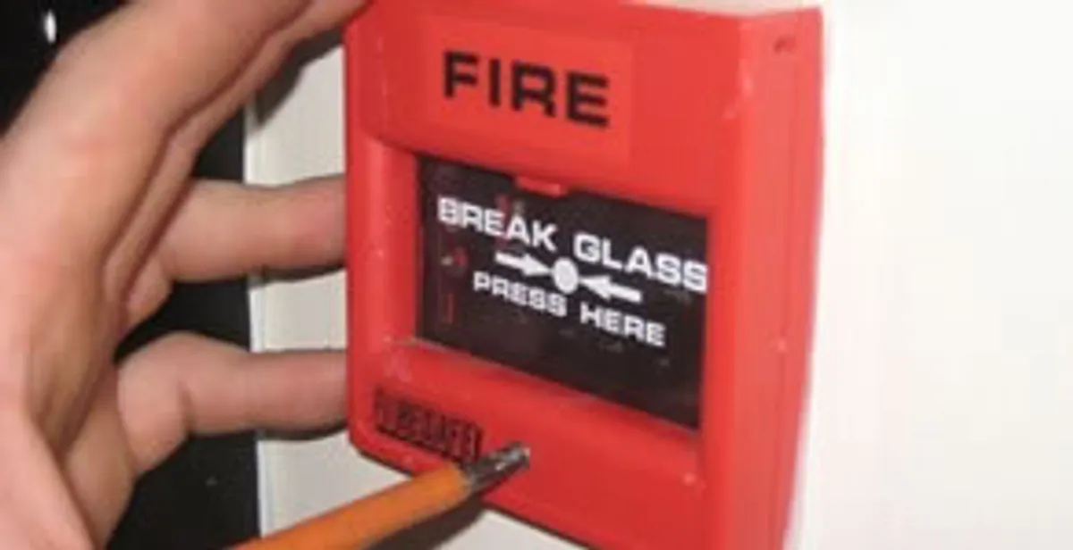 fire alarm installation service showing manual fire alarm pull station installed by licensed electricians in Mesa, AZ