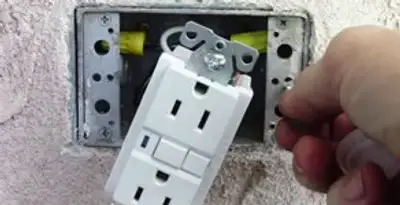 gfci circuits service showing installation of a ground fault circuit interrupter outlet by licensed electricians in Mesa, AZ