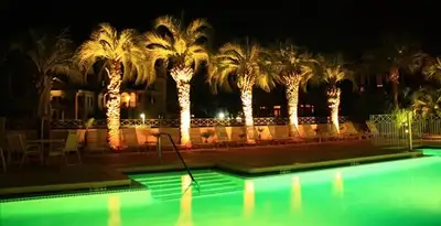 landscape lighting installation services illuminating outdoor recreational areas in Mesa, AZ