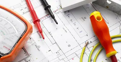 licensed electrician planning and testing electrical systems using professional tools in Mesa, AZ