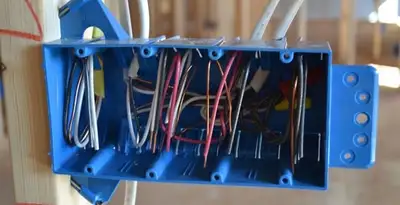 new construction wiring installation featuring electrical boxes and cable routing by expert electricians in Mesa, AZ