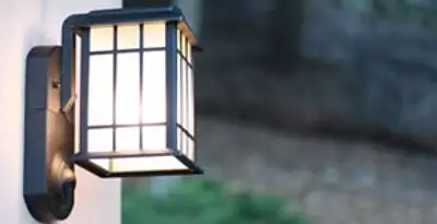 security light installation services with professionally mounted exterior wall light in Mesa, AZ