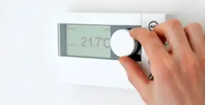 Thermostat installation service with professional adjusting temperature control in Mesa, AZ