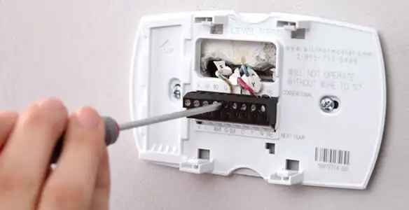 Thermostat installation service with proper wiring and secure wall mounting in Mesa, AZ