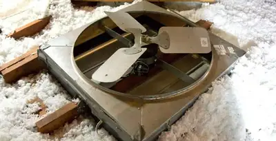 whole house fan installation services with attic-mounted ventilation unit in Mesa, AZ